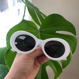 white oval shaped sunnies
